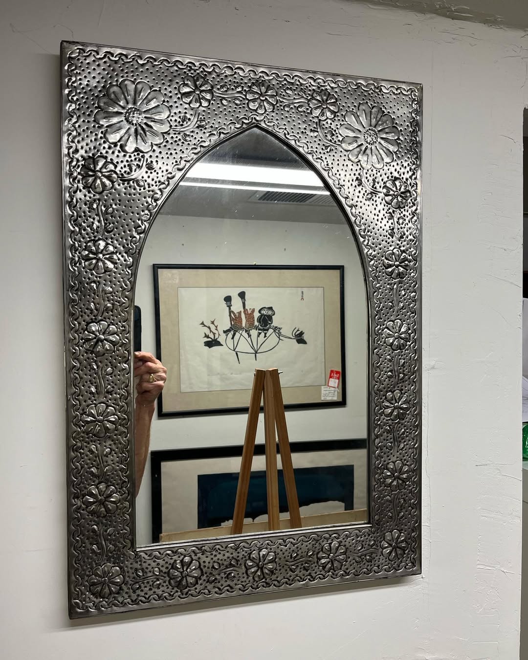 Tin mirrors bounce light and add charm