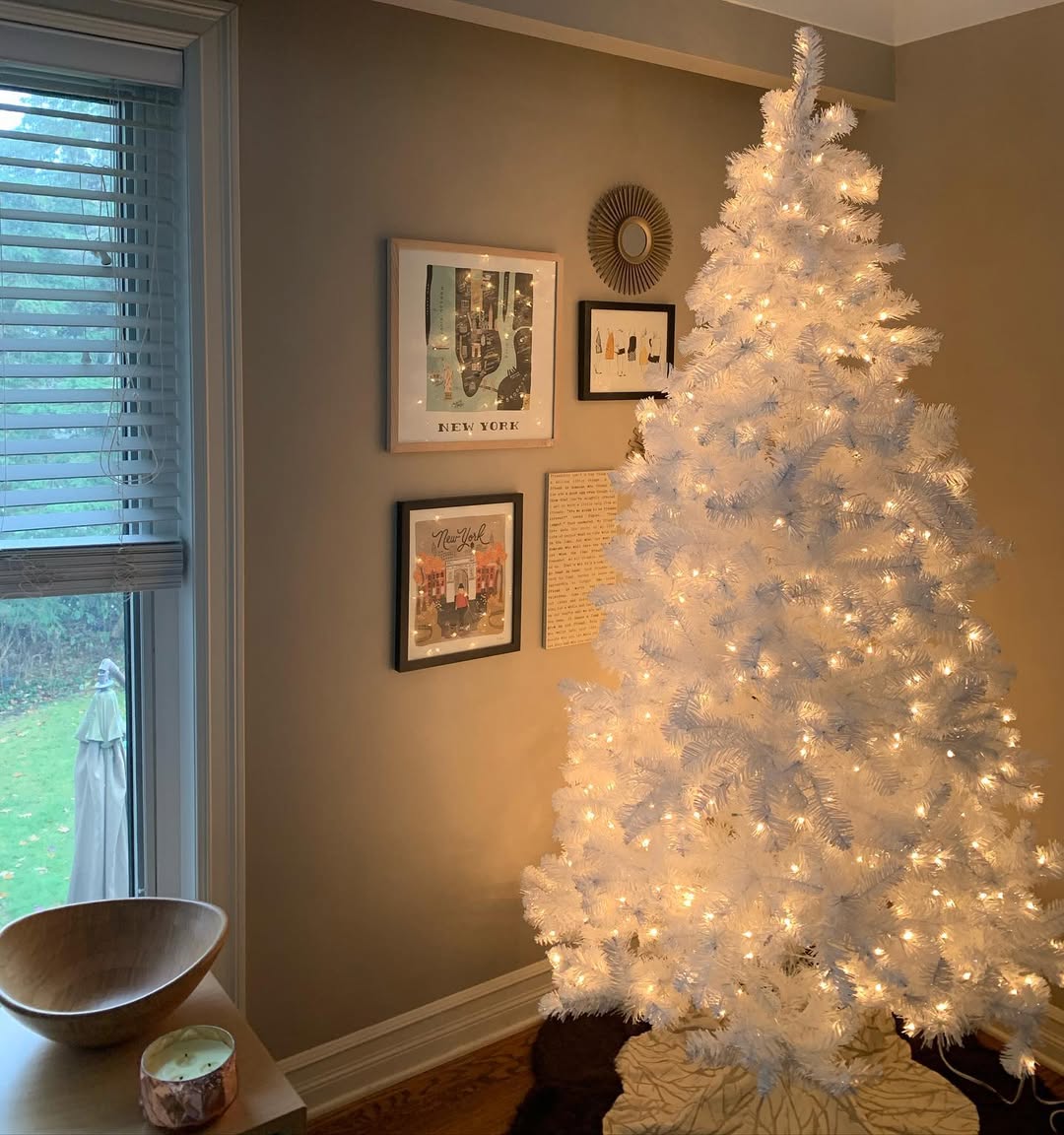Gold lights make white tree magical