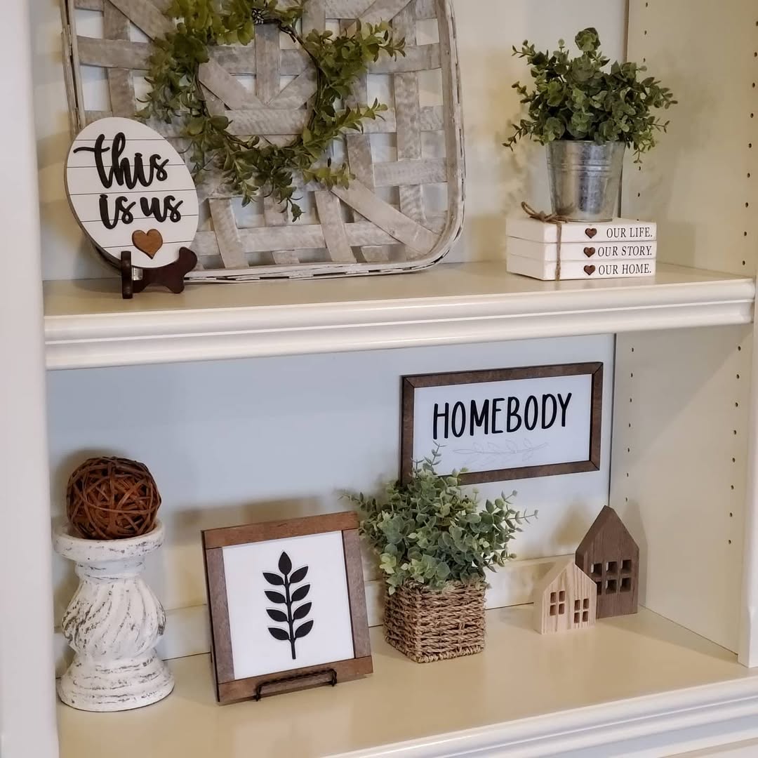 Cozy shelves styled with wood, greenery, and woven accents