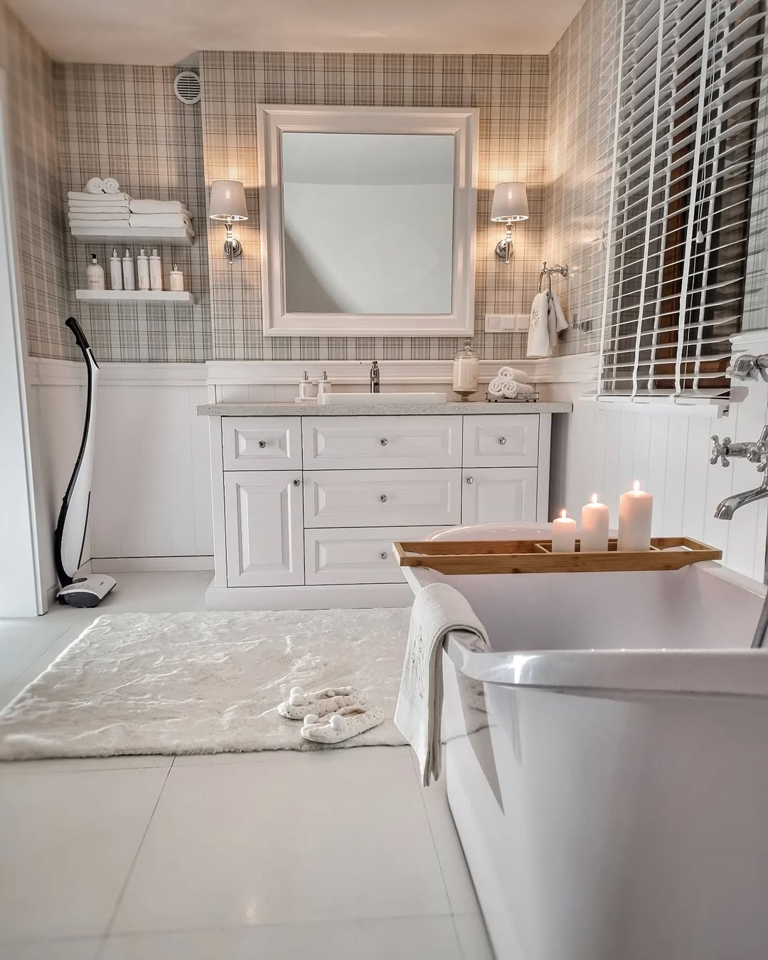 Rugs, towels, curtains, add depth to bathroom